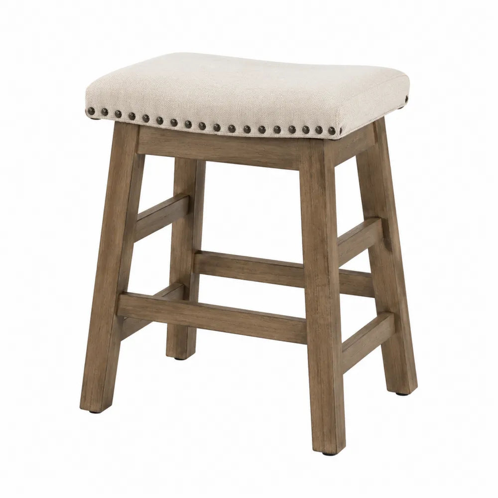 Tabouret de bar carré rembourré en polyester beige avec clous tapissiers et cadre hévéa massif chêne grisé 45 x 45 x 66 cm